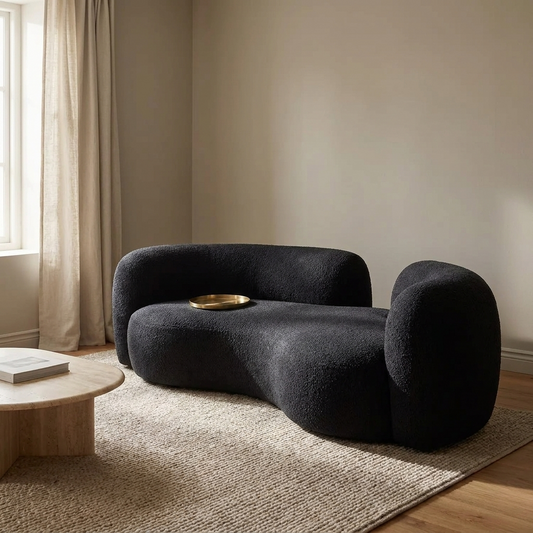 Luca curved sofa styled in a living room