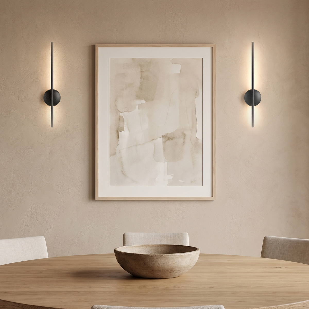 A pair of Vela Wall Sconces in matte black