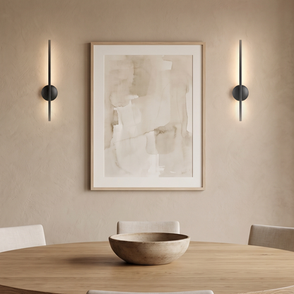 A pair of Vela Wall Sconces in matte black