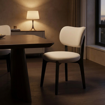 Brae dining chair, lit at night