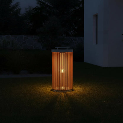 Solstice Garden Lantern - glowing in the garden at night