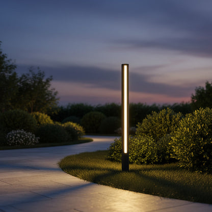 Pharos Bollard Light styled in a garden pathway
