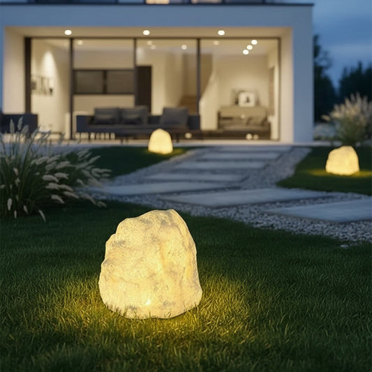 Cairn Stone Lamp - styled on a garden lawn