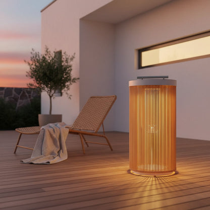 Solstice Garden Lantern styled on a patio at dusk
