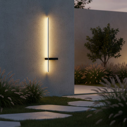 Solstice Linear Sconce styled on a garden path