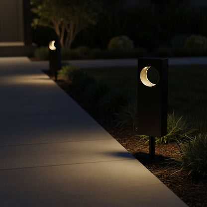 Lunaris Solar Bollard styled along a walkway at night