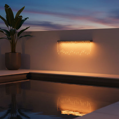Cascade Outdoor Light styled by a poolside terrace at twilight