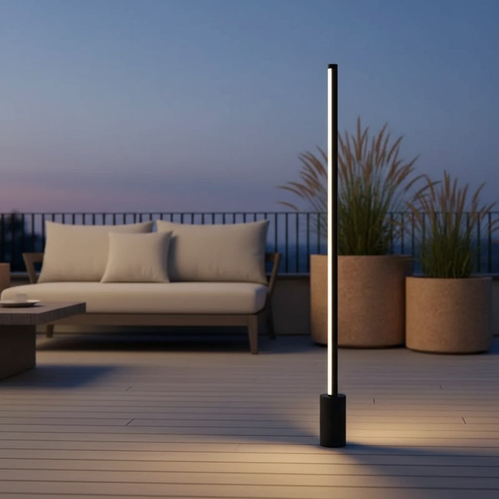 Lumira Bollard Light styled on a luxury deck patio