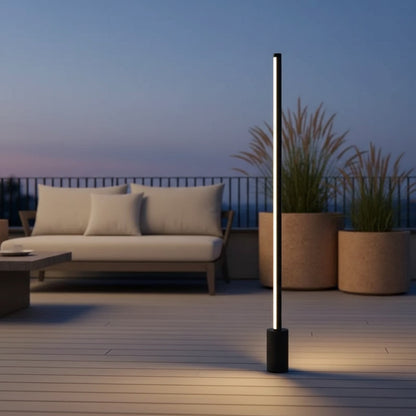 Lumira Bollard Light styled on a luxury deck patio