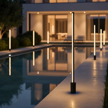Lumira Bollard Light styled at a villa poolside