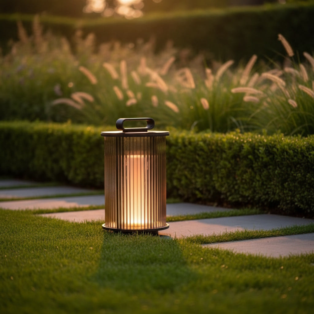 Solene Lantern styled in a garden at golden hour