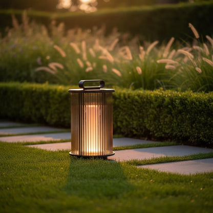 Solene Lantern styled in a garden at golden hour