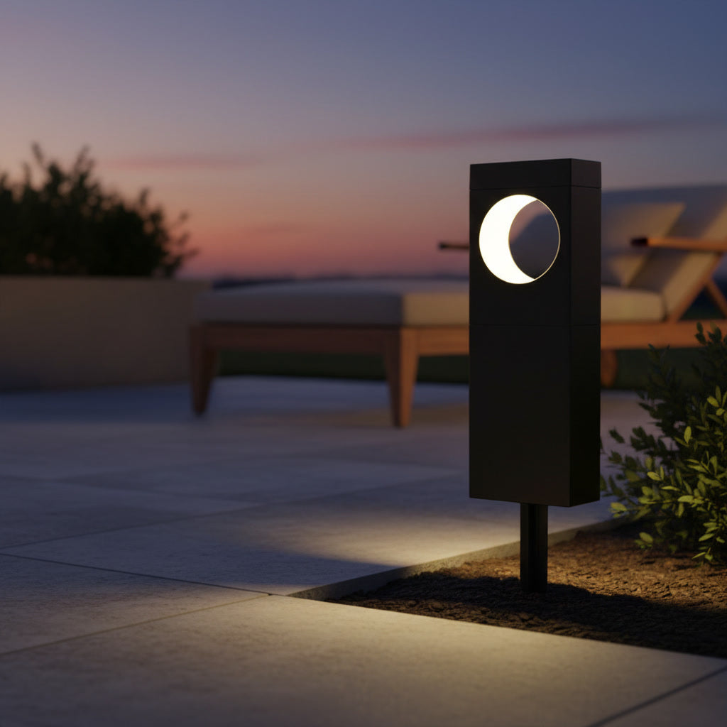 Lunaris Solar Bollard styled on a patio at sunset