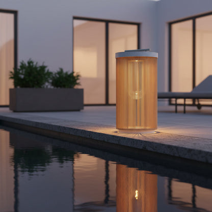 Solstice Garden Lantern styled poolside at twilight