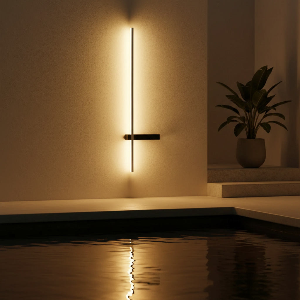 Solstice Linear Sconce styled by a poolside