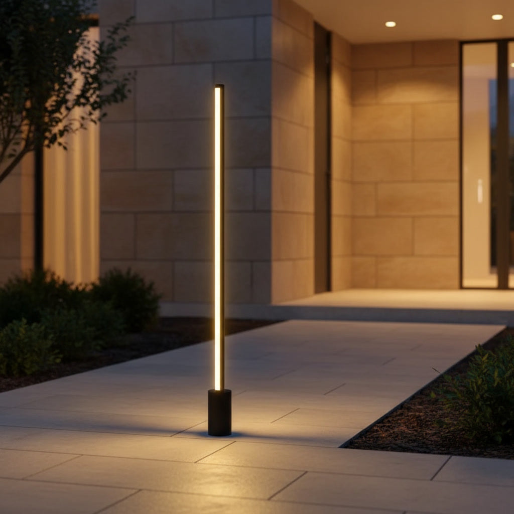 Lumira Bollard Light styled at a villa entrance walkway