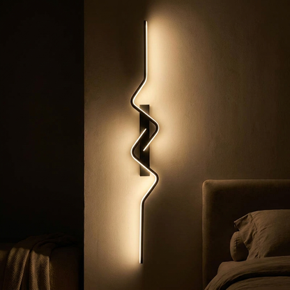 Maren wall sconce, lit at night
