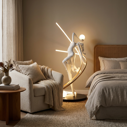 Muse sculptural floor lamp styled in a bedroom corner