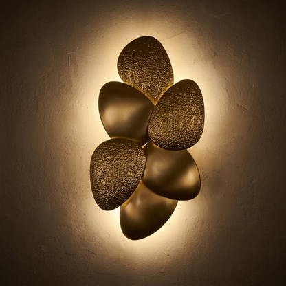 Nacre wall sconce, lit at night