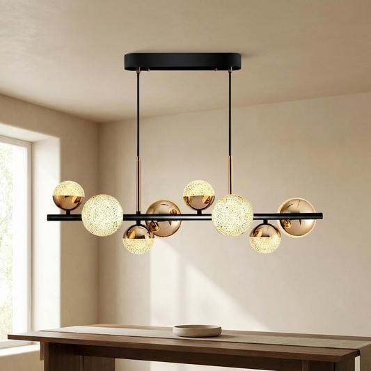 Orion Gilded Orb Chandelier styled in a dining