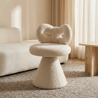 Petra vanity stool styled in a living room
