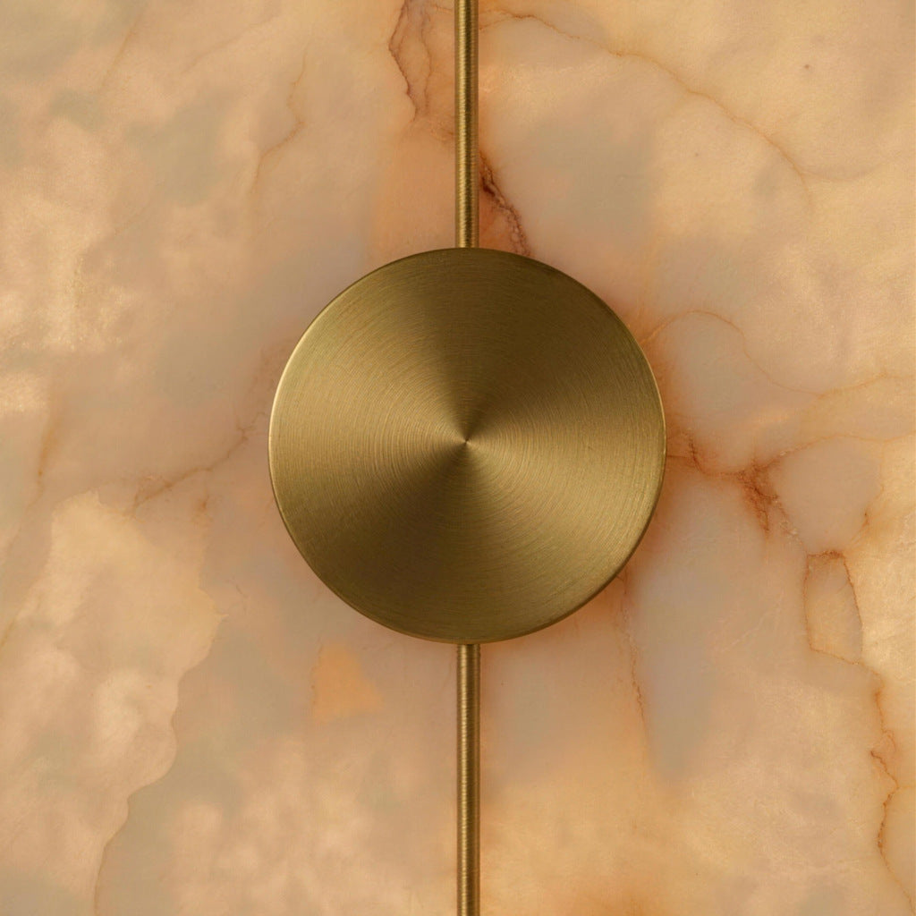 Selene Alabaster Sconce - alabaster veining detail with brushed brass hub