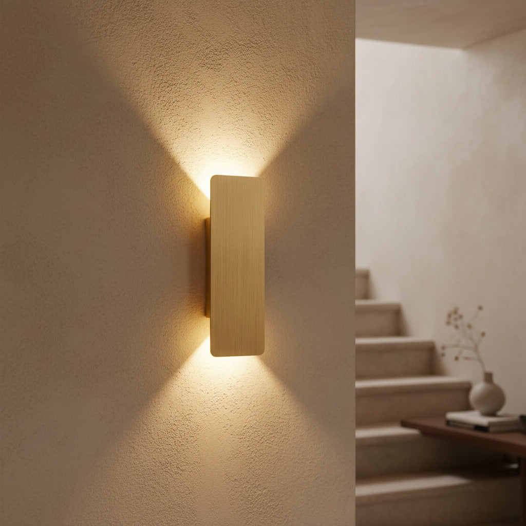 Vesper sconce styled in a hallway